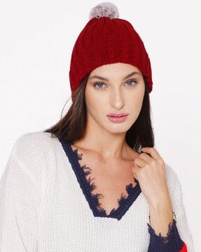 beanie cap with pom-pom accent