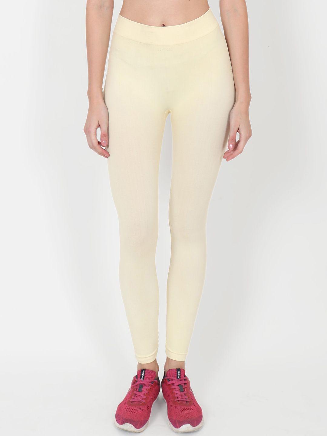 beau design women cream-coloured solid yoga tights