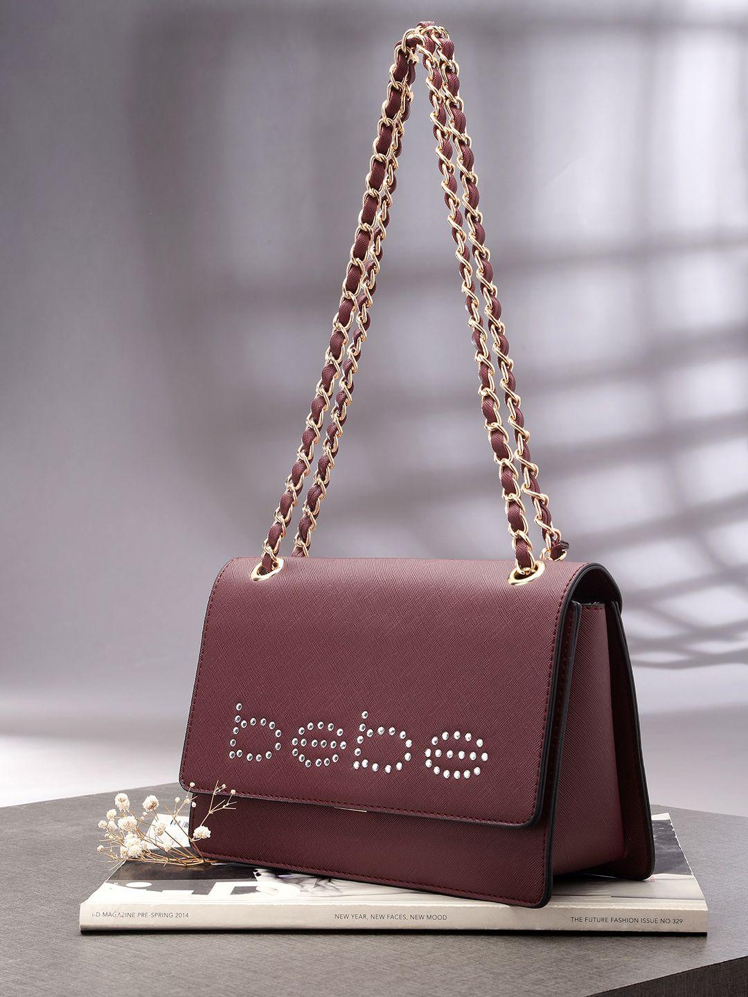 bebe women burgundy embellished structured sling bag