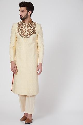 beige embroidered & textured brocade sherwani