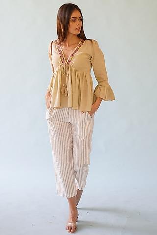 beige embroidered top