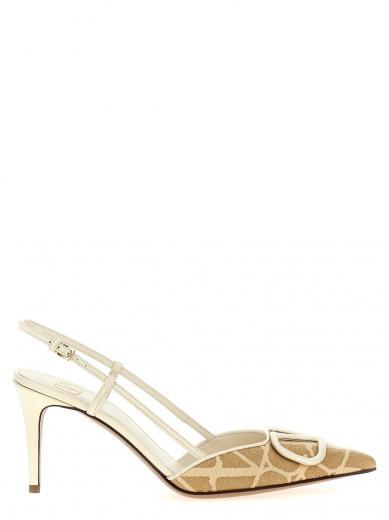 beige pointed toe pumps