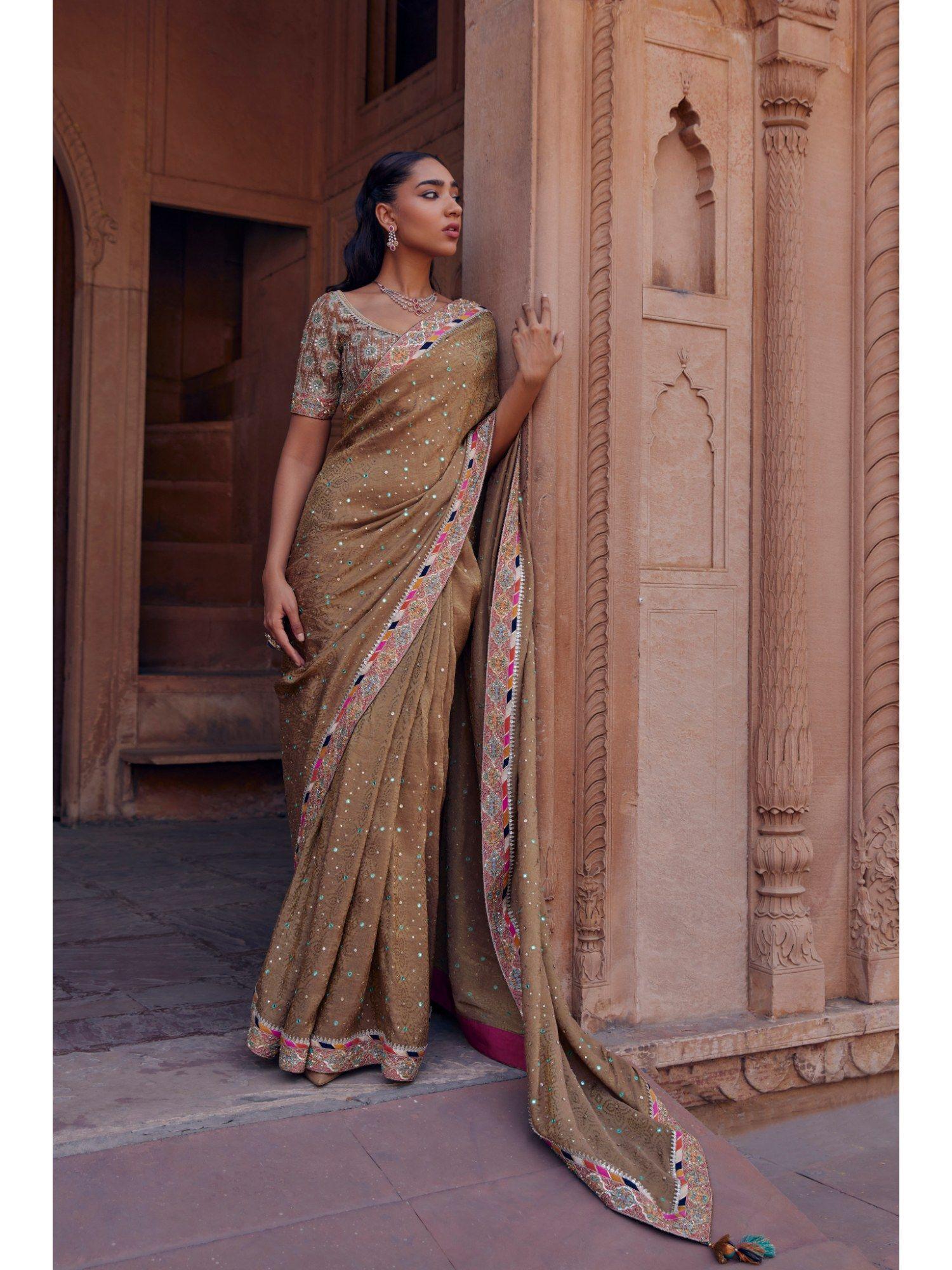 beige chhaya saree with stitched blouse