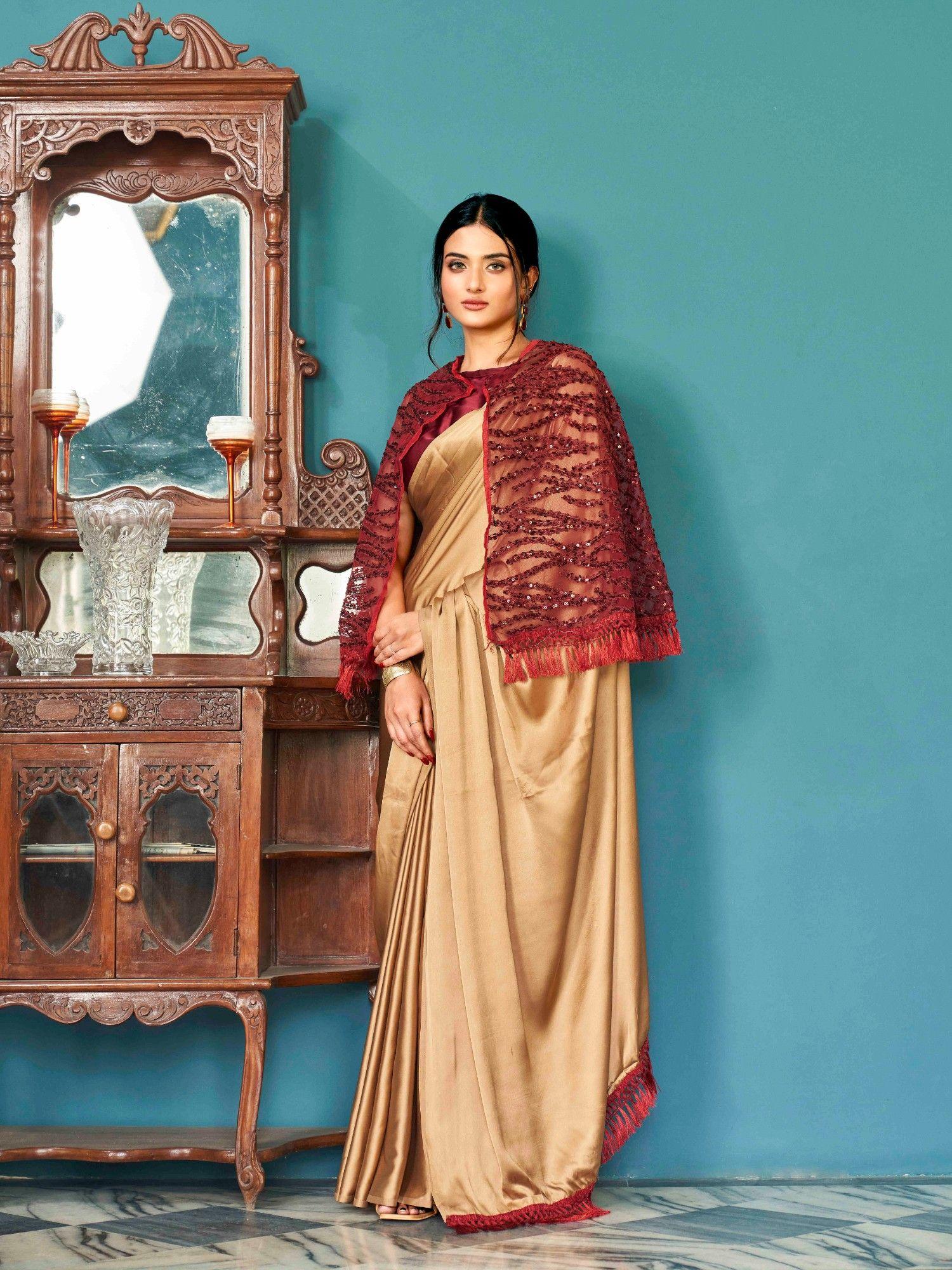 beige color satin saree and sequence embroidery net cape and unstitched blouse