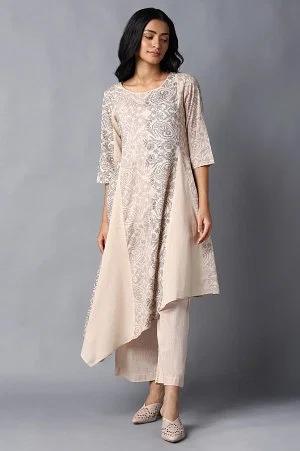 beige colour blocked asymmetric kurta in floral print and round neck