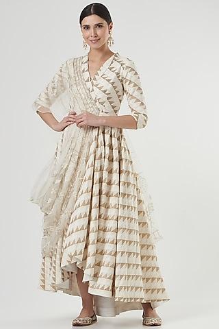 beige cotton gown with drape