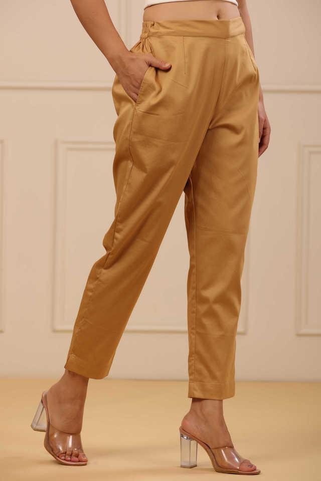 beige cotton solid slim fit pants with partially elasticated waistband