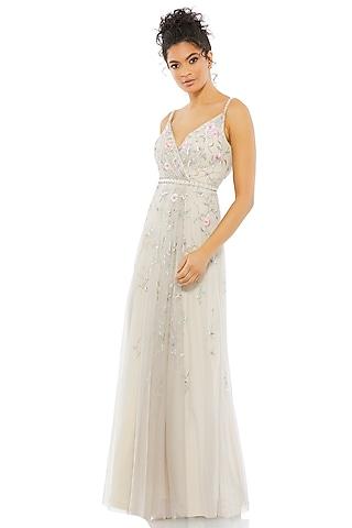 beige embroidered fabric wrap over gown