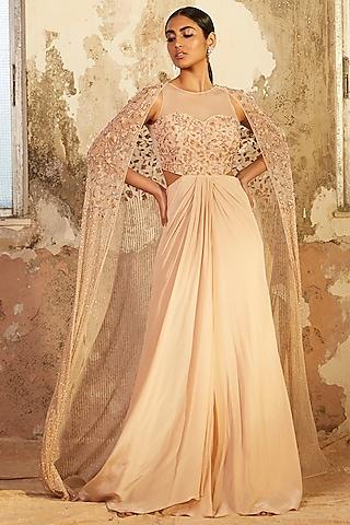 beige embroidered gown with cape