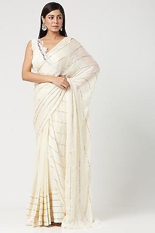 beige embroidered saree set