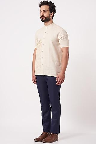 beige embroidered shirt