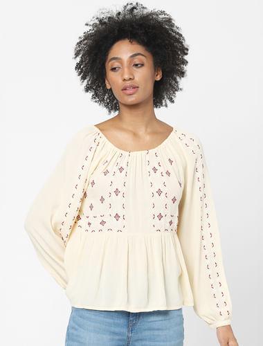 beige embroidered top