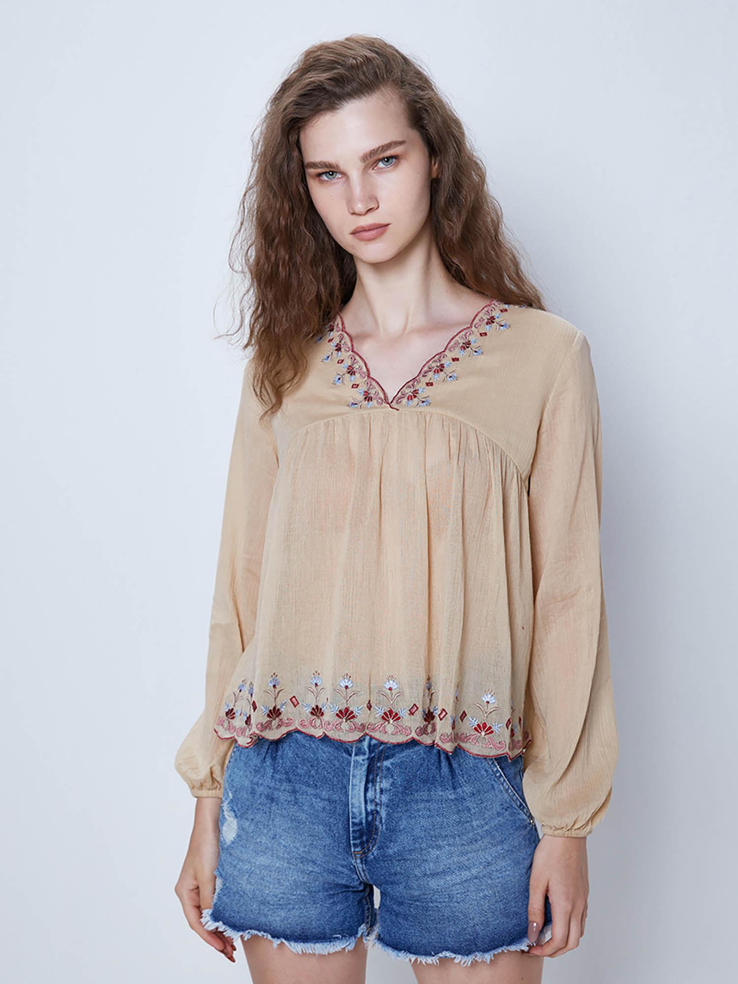 beige embroidered v-neck top