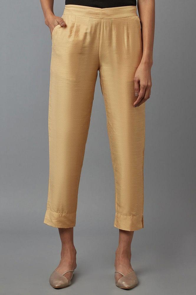 beige festive trousers