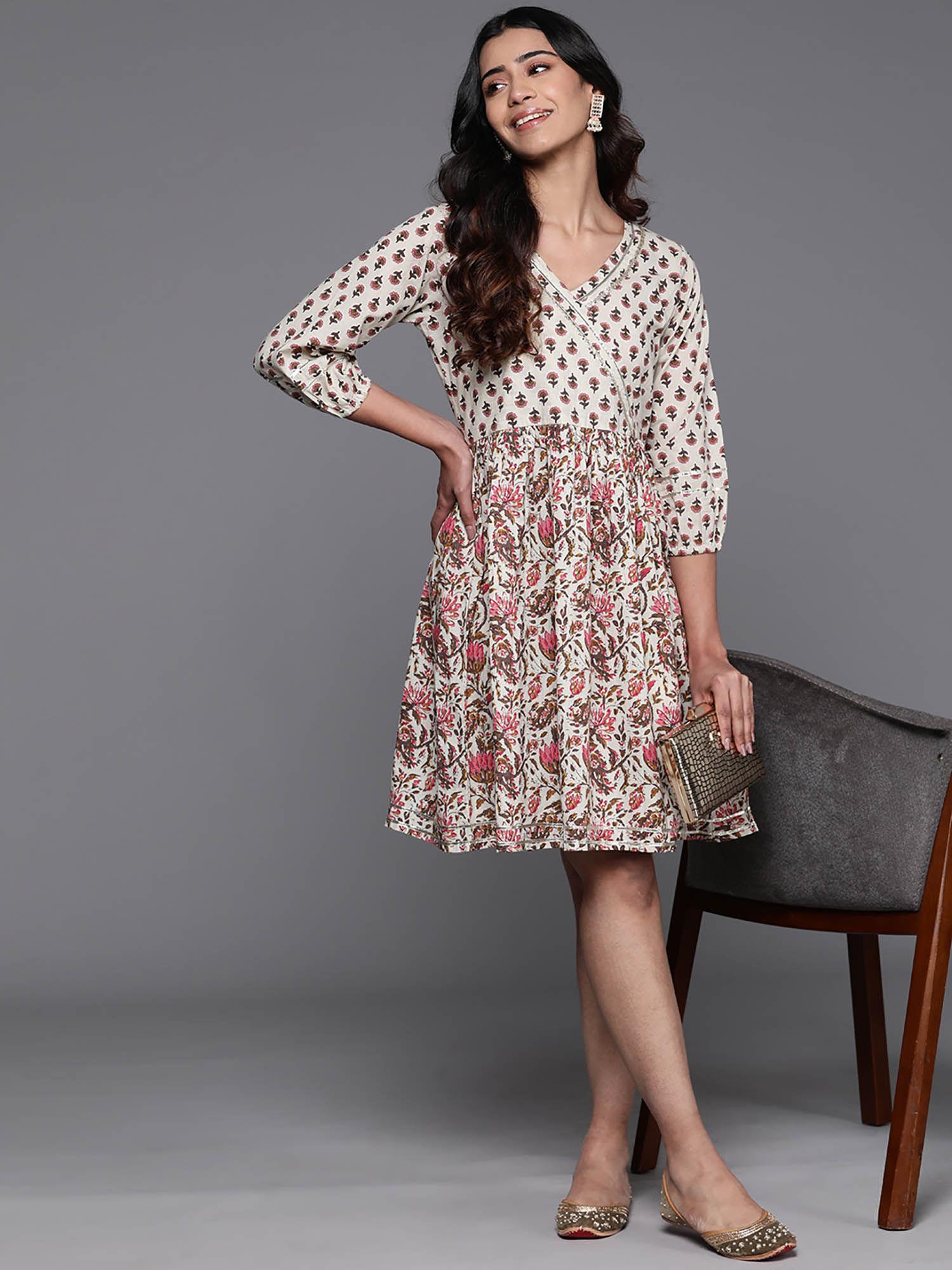 beige floral printed cotton mini dress with a pleated style & gotta patti detail