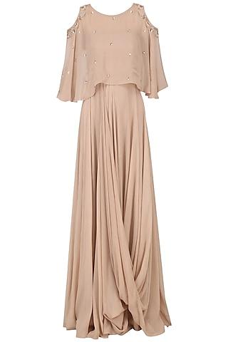 beige gown with embroidered cape