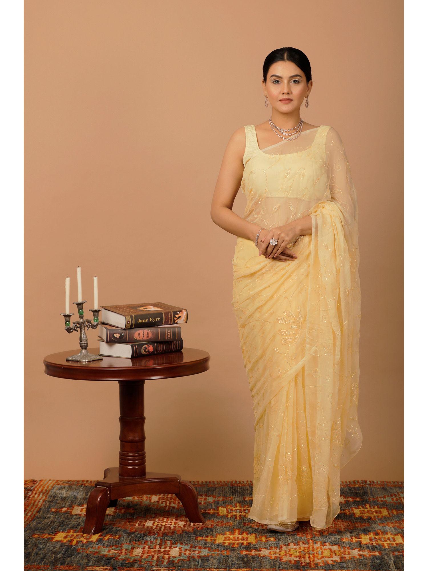 beige handcrafted sequins jaal chiffon saree