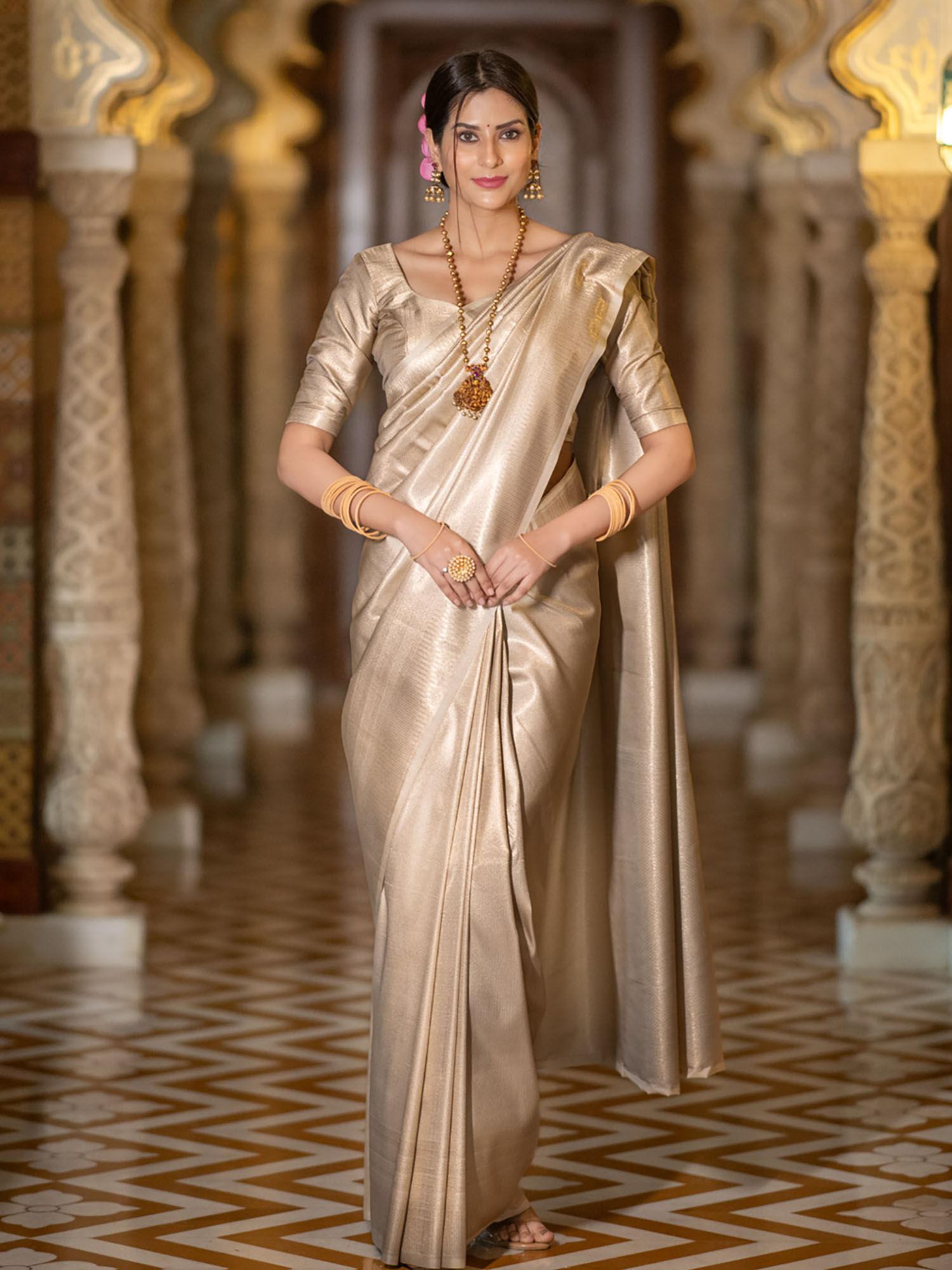 beige kanchipuram silk saree with unstitched blouse