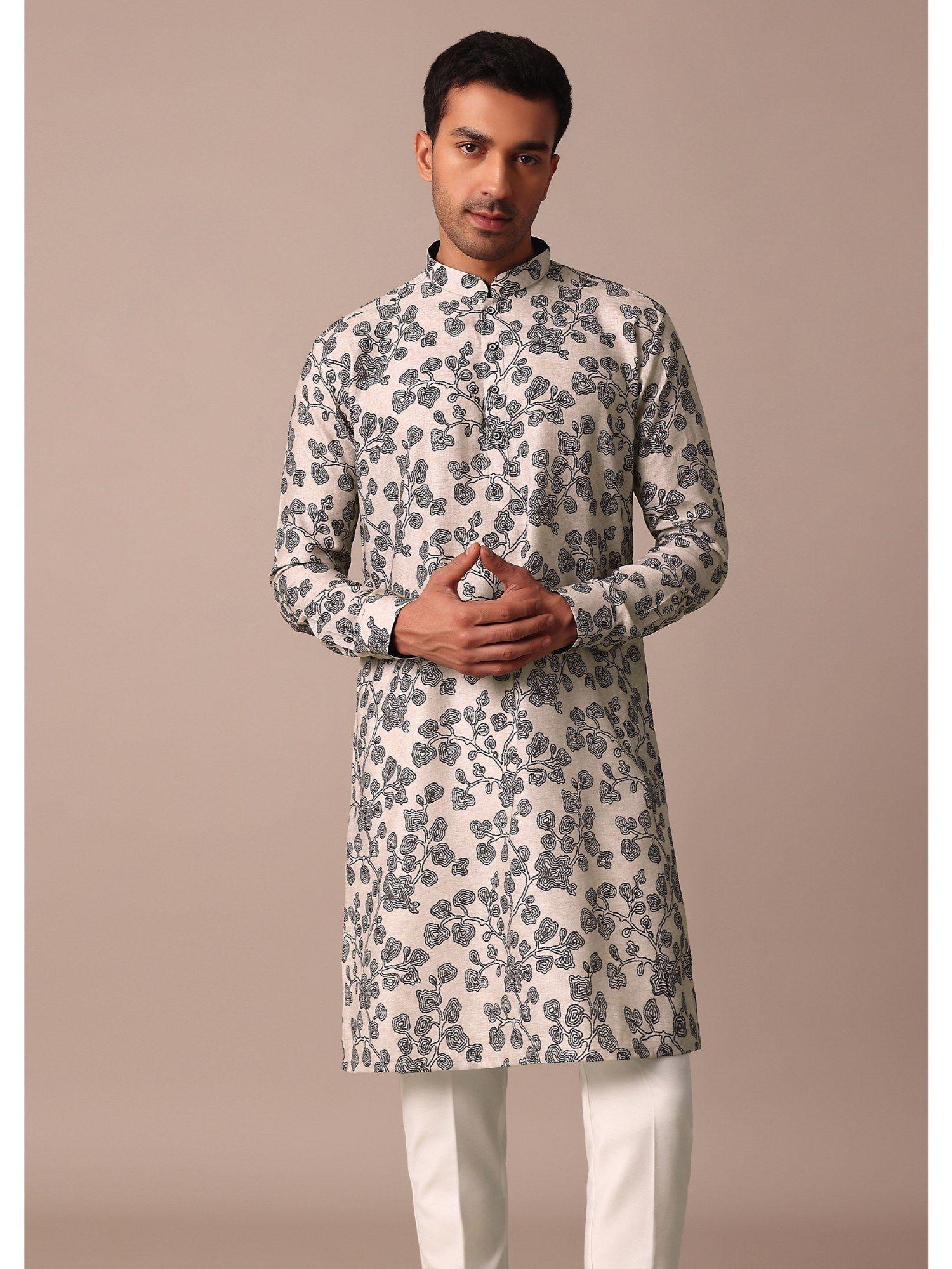 beige kurta with thread work motifs