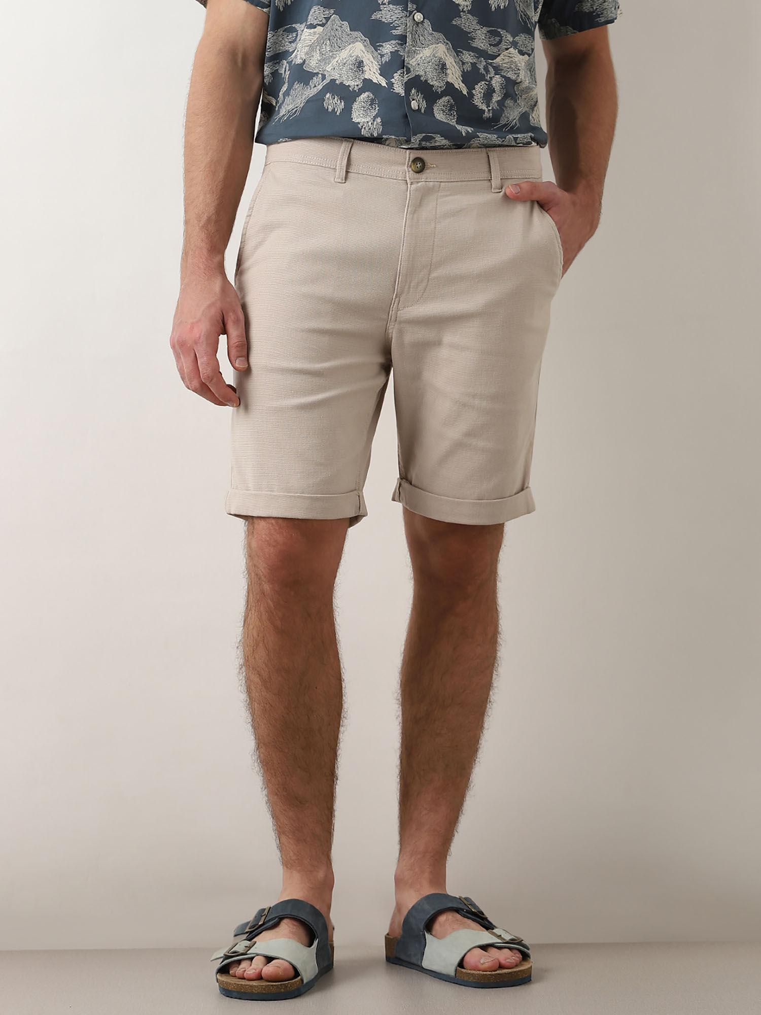 beige mid rise cotton shorts
