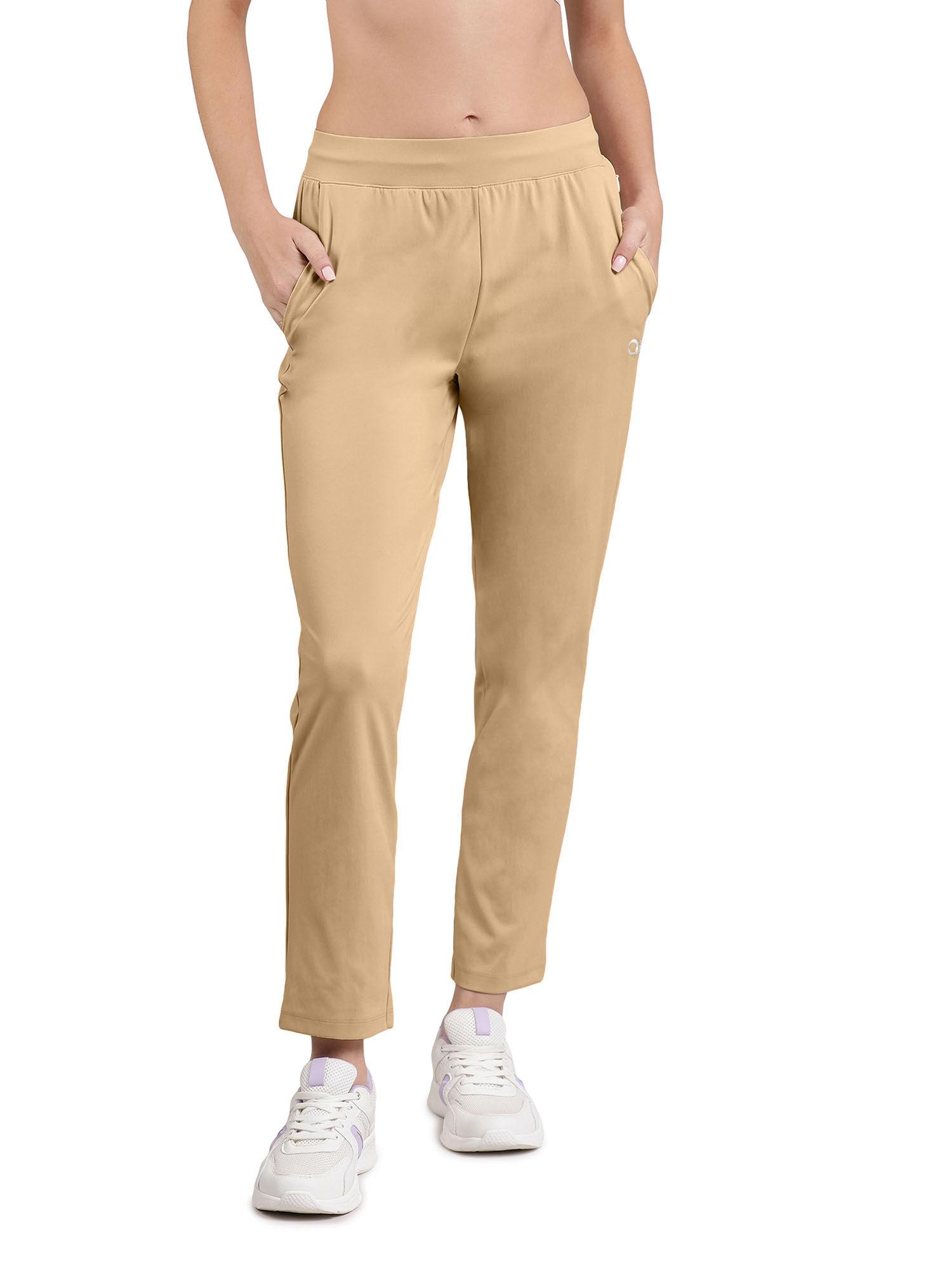 beige mid rise full length energize flexi track pant