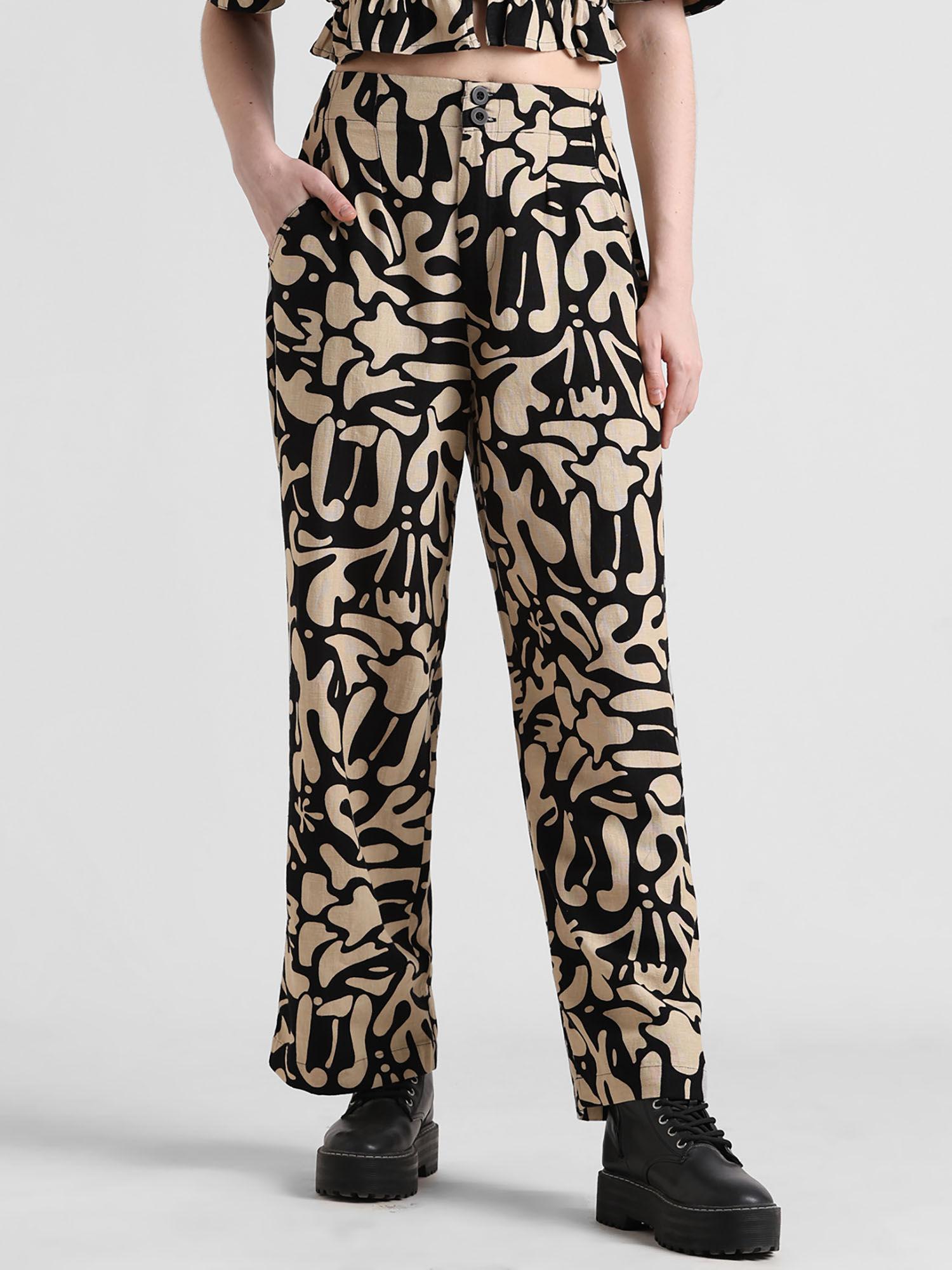 beige mid rise printed flared pants