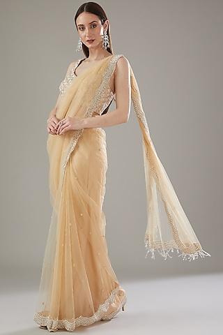 beige net embellished draped saree set