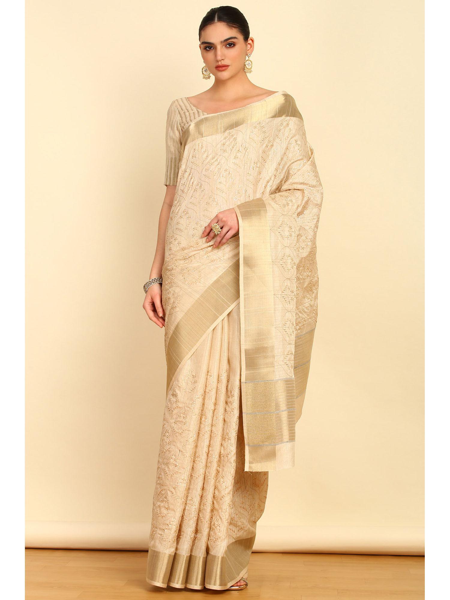 beige ogee embroidery tussar saree with sequins details with unstitched blouse