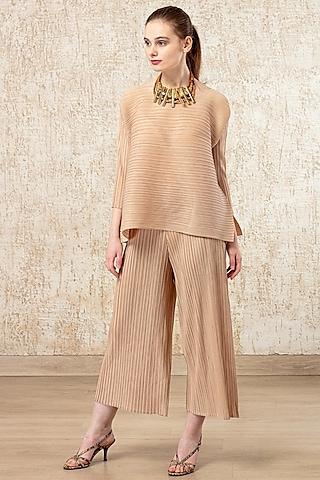 beige pleated top with pants