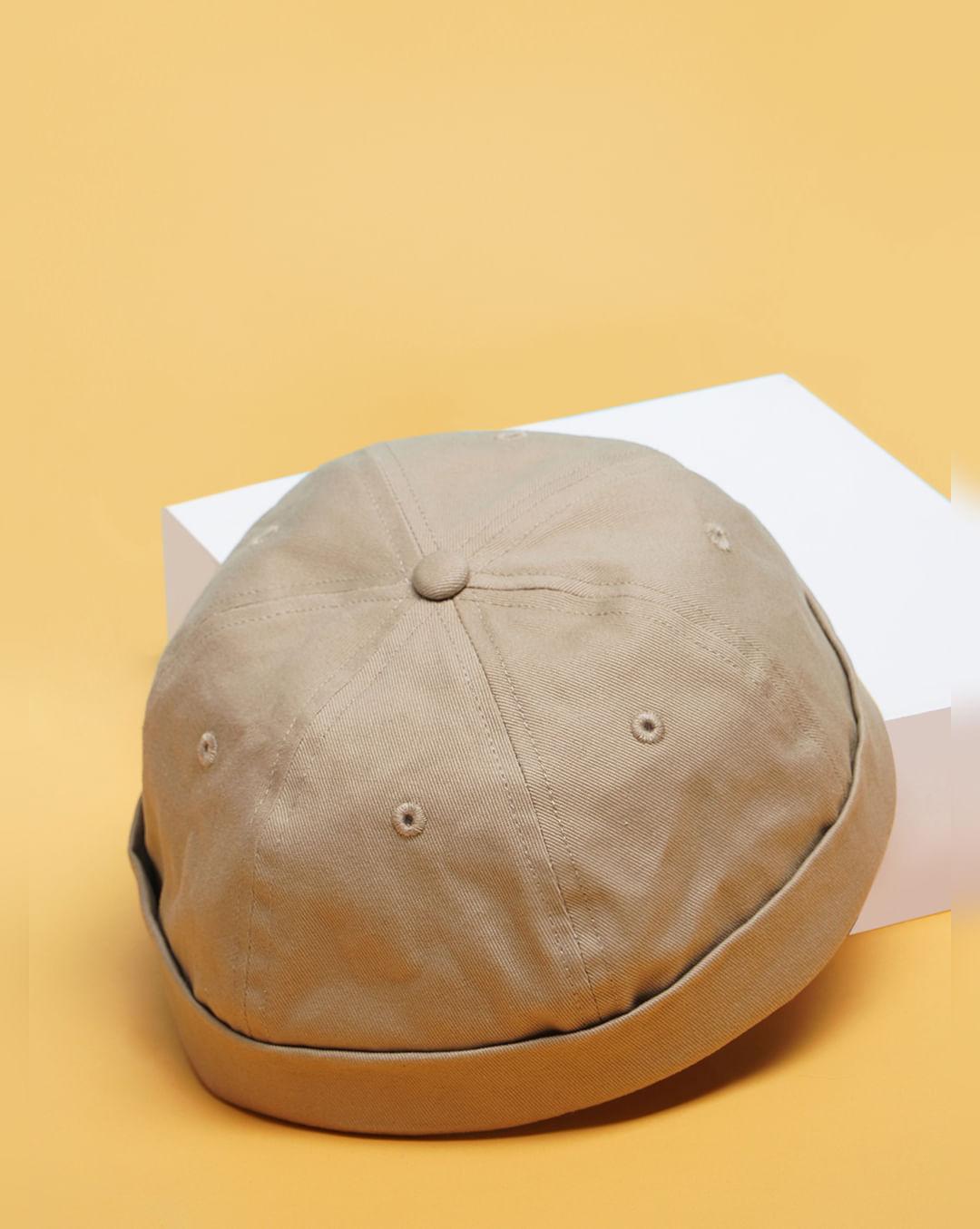 beige roll hat