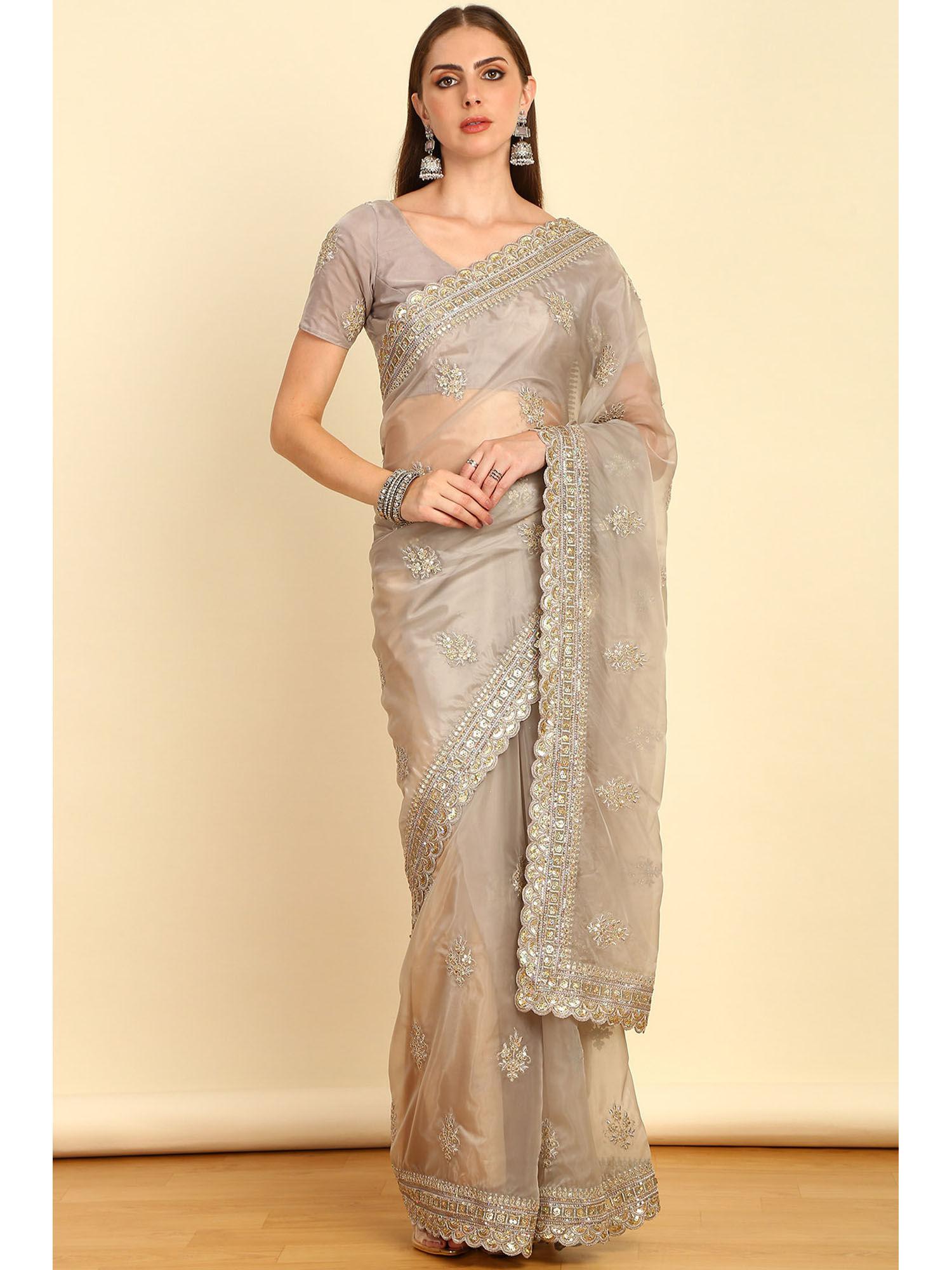 beige sequinned embellished organza saree with zardozi with unstitched blouse