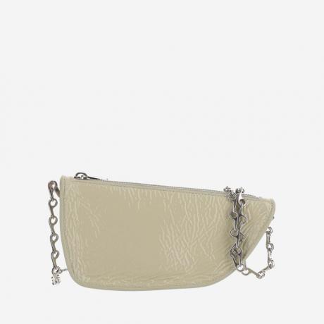 beige shield sling crossbody bag