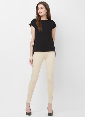 beige skinny jeggings