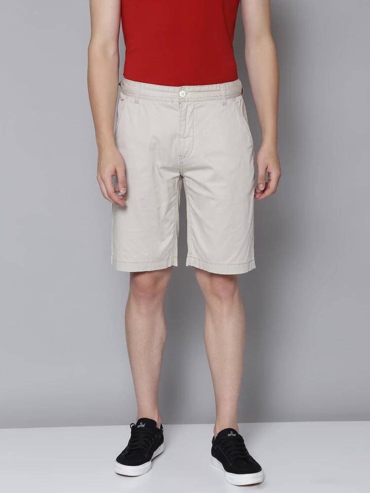 beige solid regular fit shorts