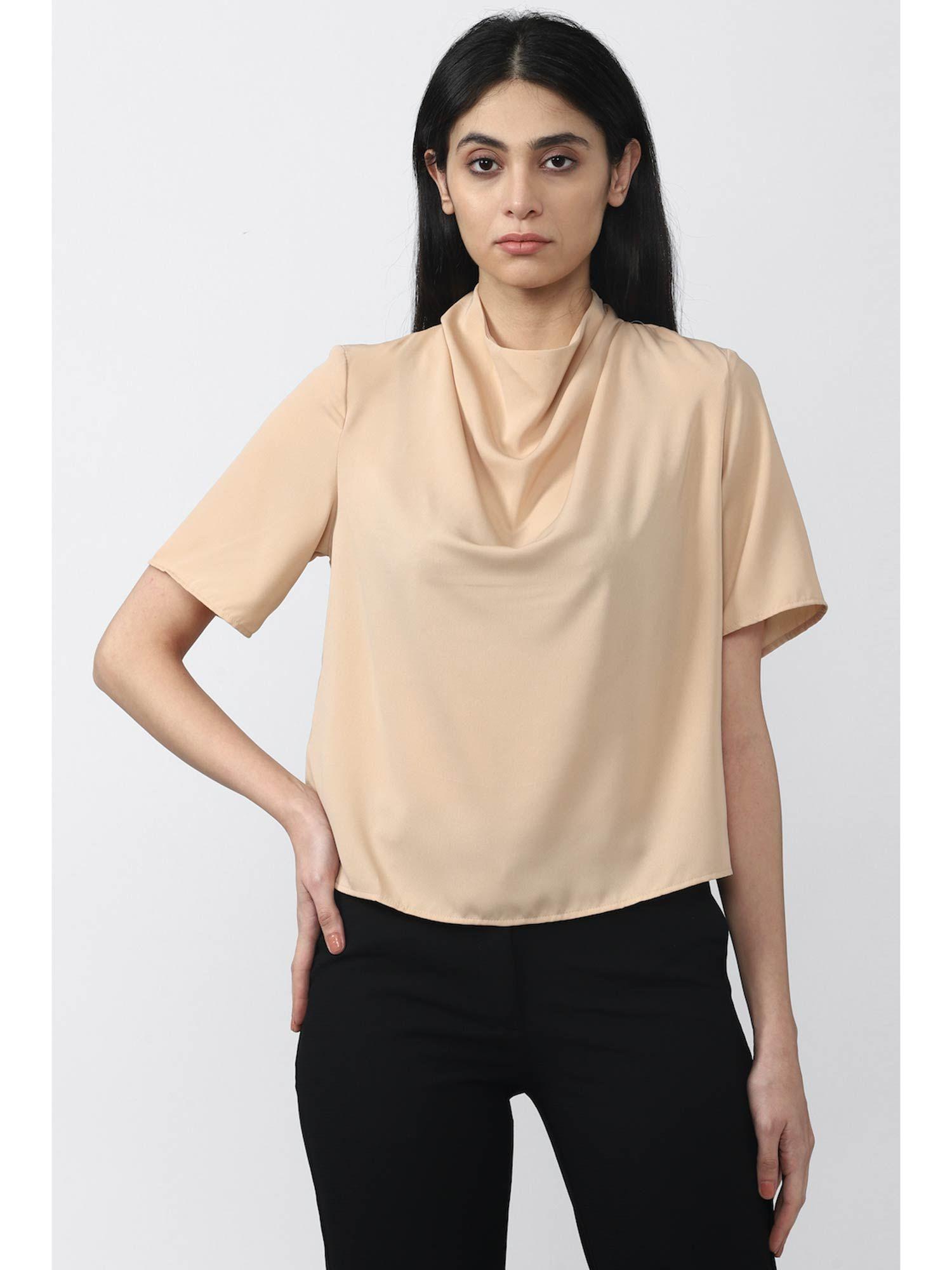 beige top