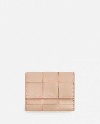 beige tri-fold wallet