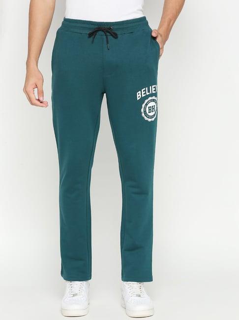 being human teal regular fit printed trackpants