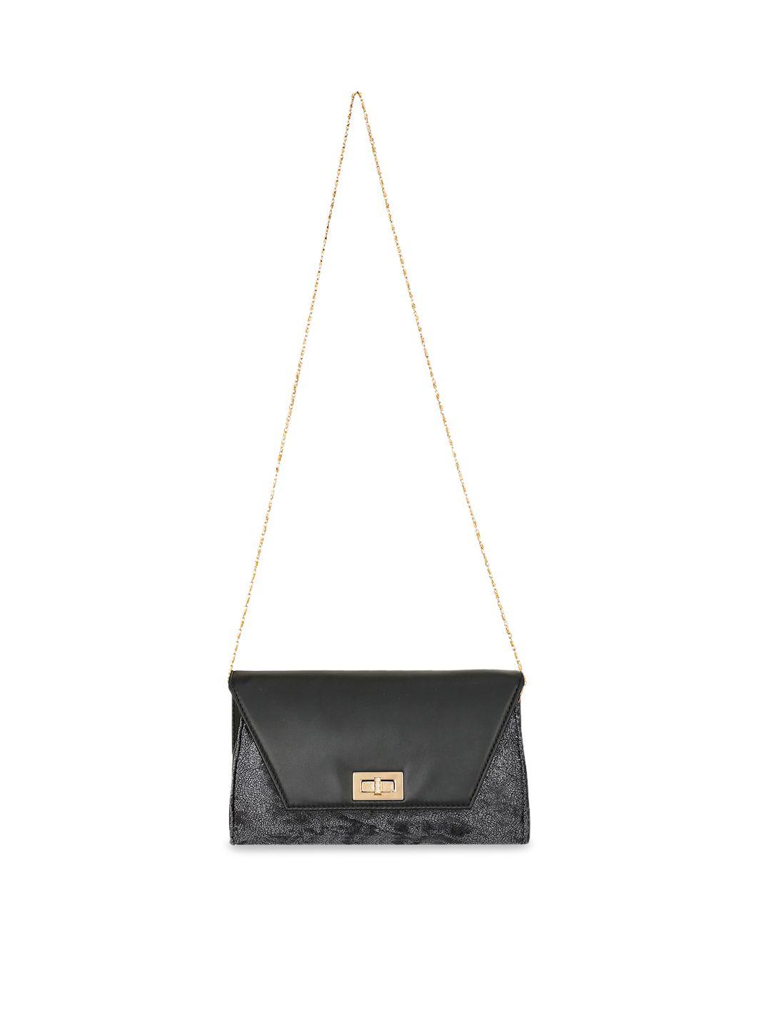 berrypeckers black structured sling bag with tasselled