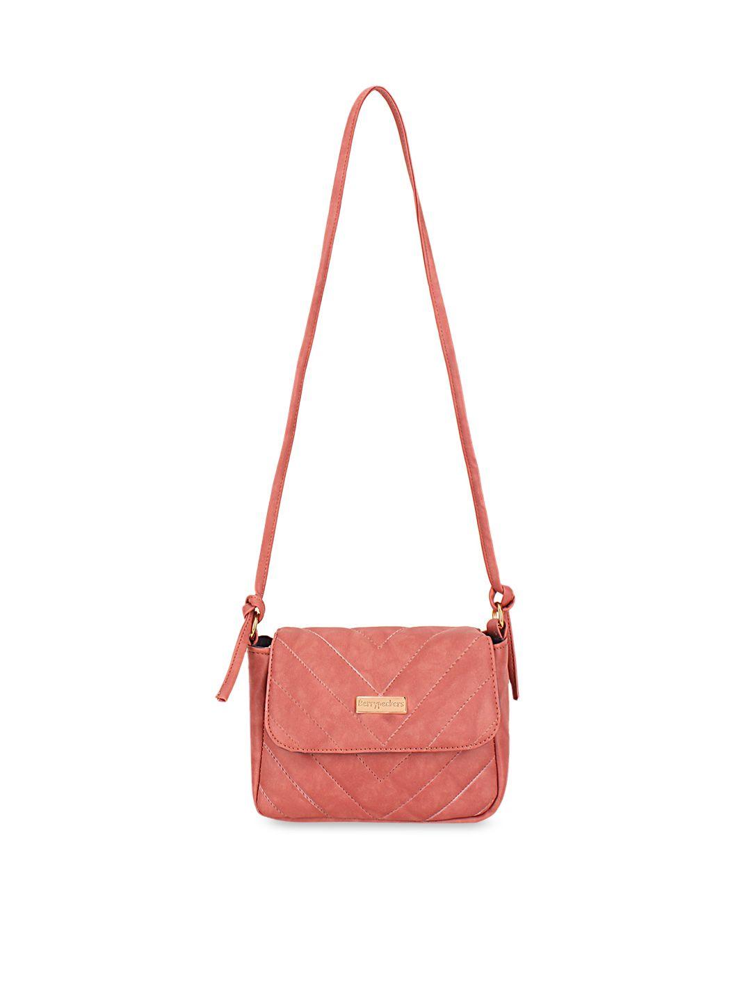 berrypeckers peach-coloured structured sling bag with quilted