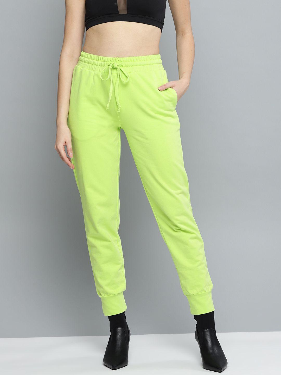 besiva women fluorescent green solid joggers