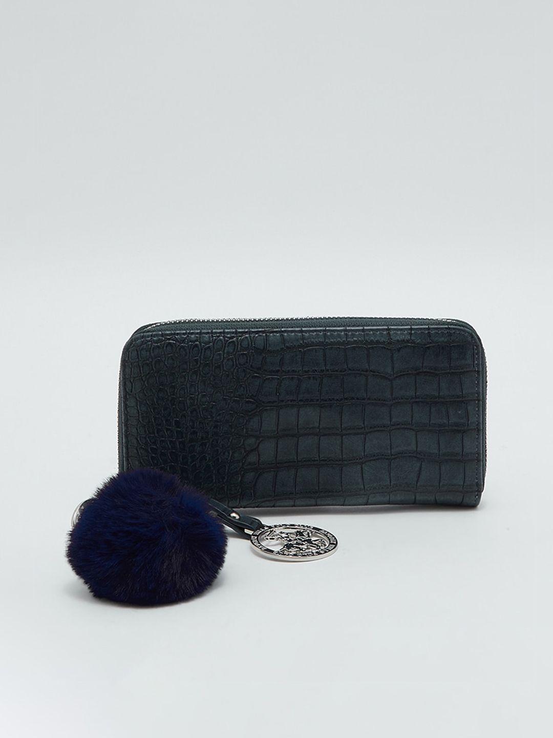 beverly hills polo club navy blue animal textured pu structured sling bag with tasselled