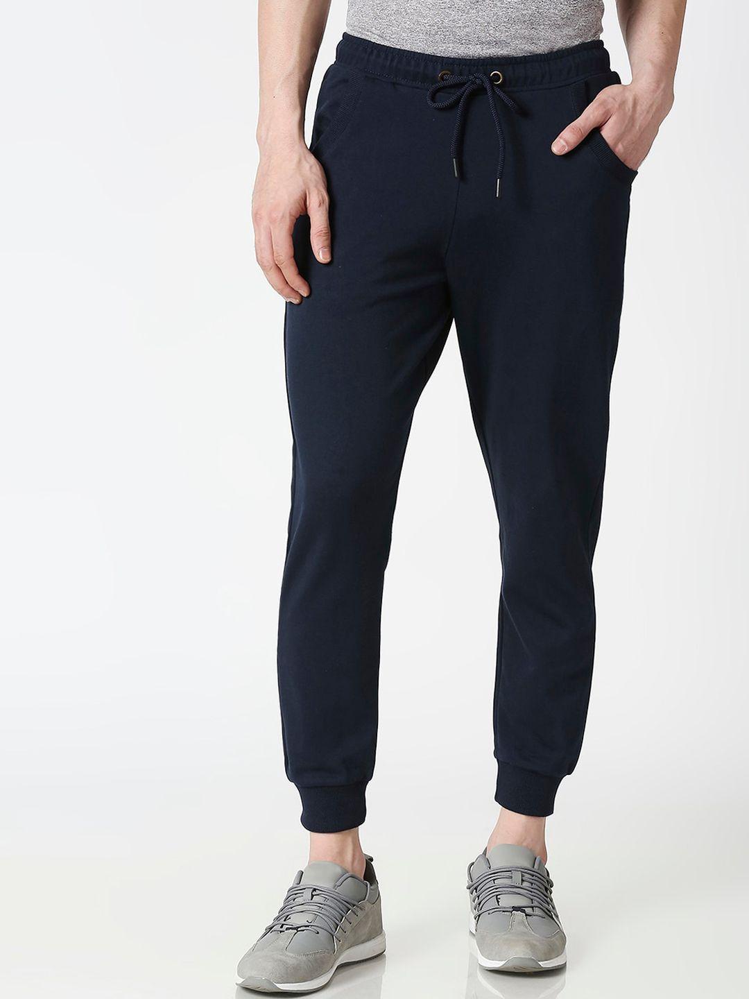 bewakoof men cotton blend navy blue solid straight fit joggers