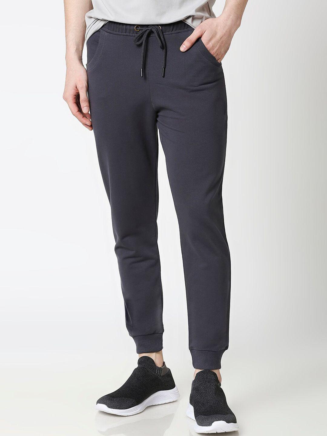 bewakoof men navy blue solid straight-fit joggers