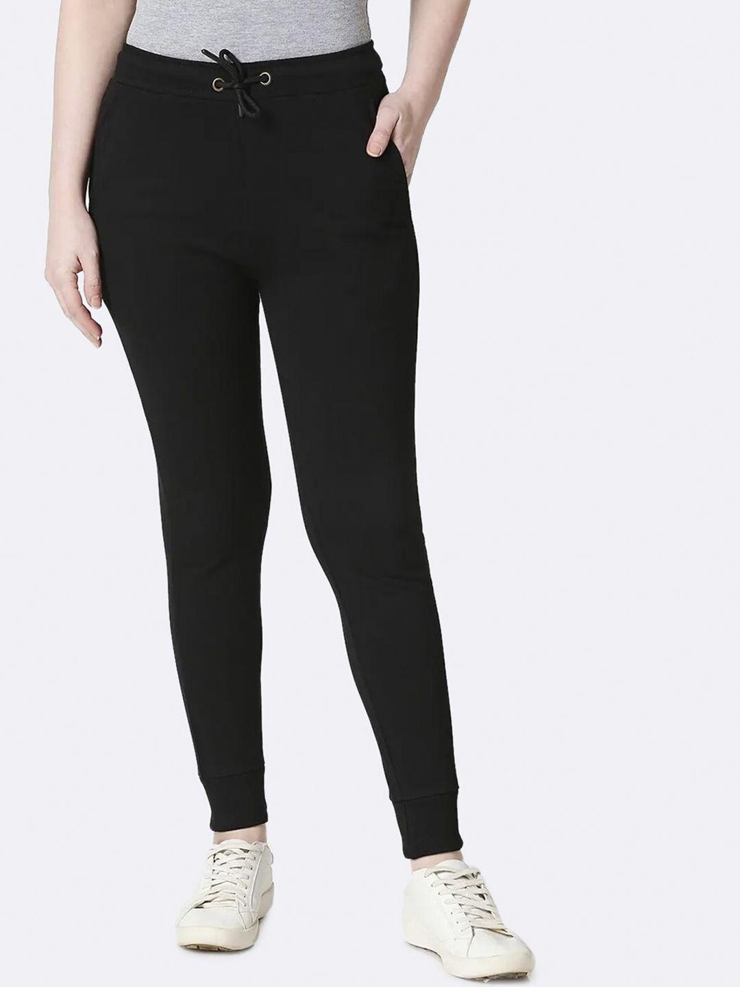 bewakoof women cotton blend black solid joggers