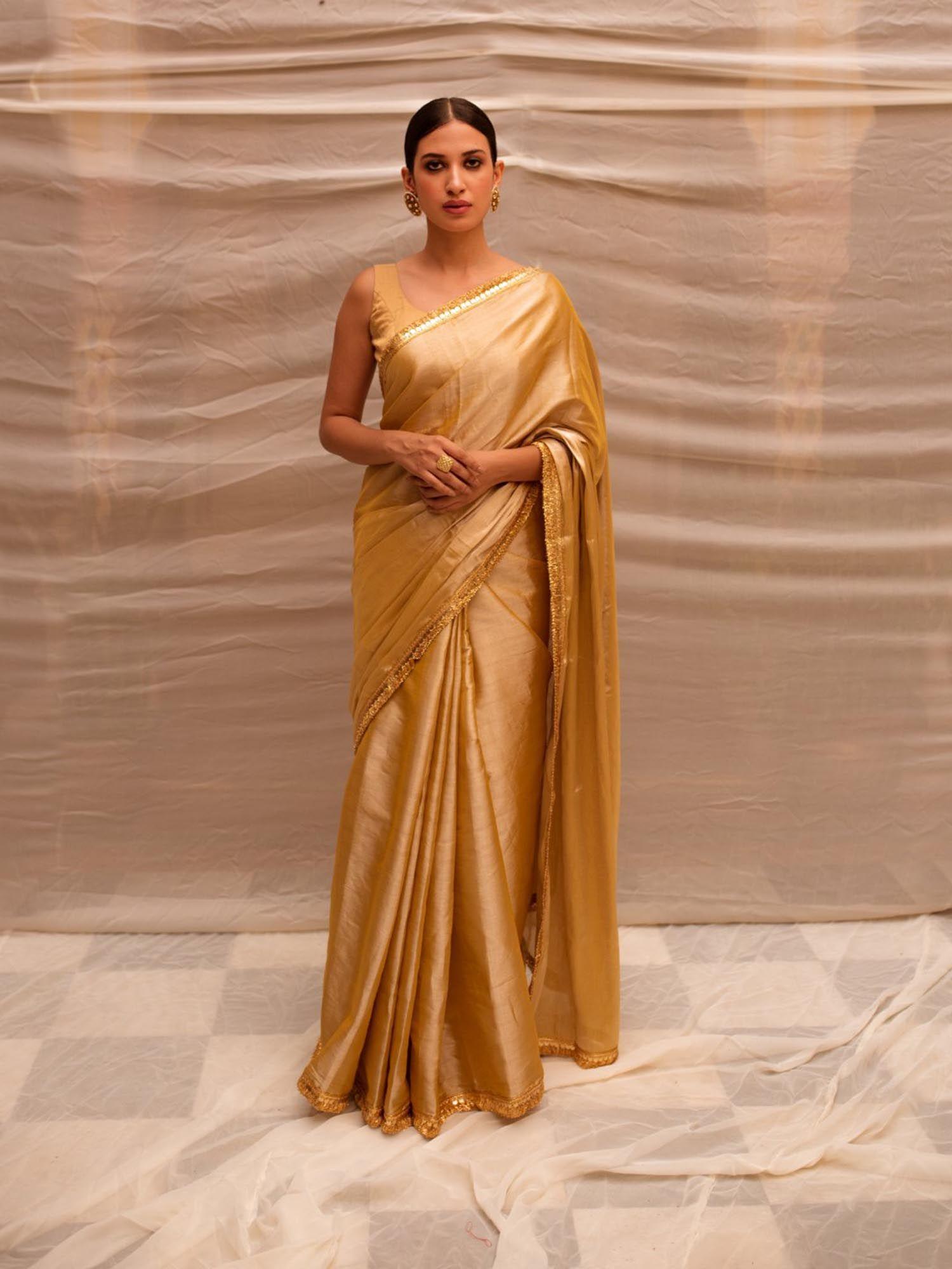 bhuvaneshwari beige chanderi tissue saree with unstitched blouse