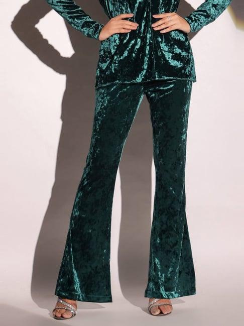 binfinite emerald green showtime velvet flared trousers