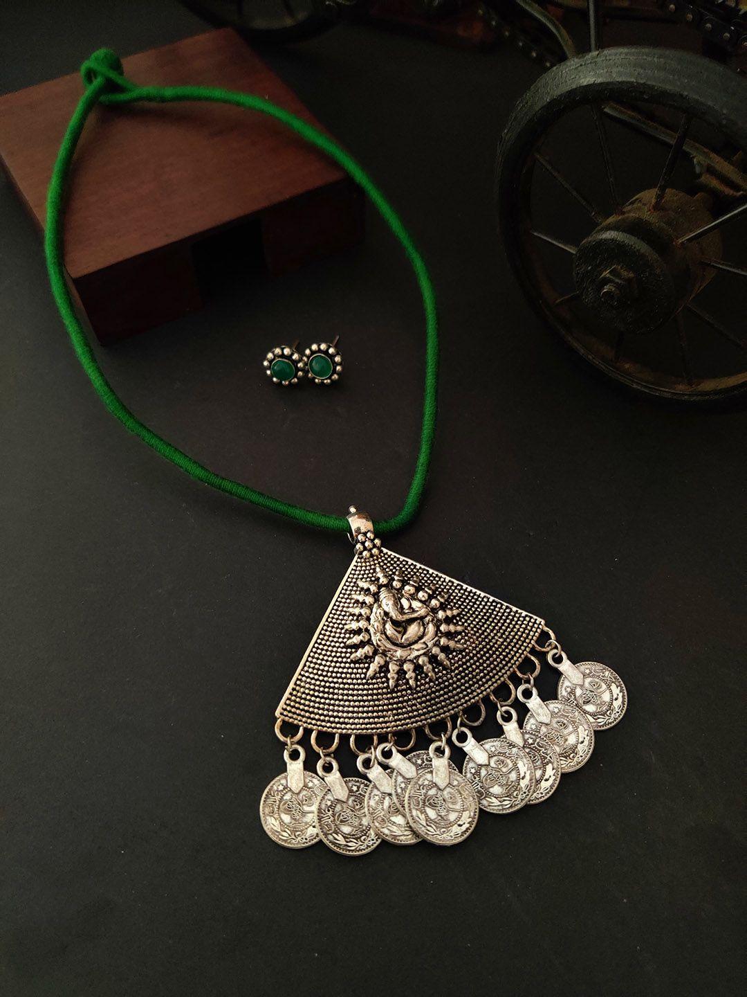 binni's wardrobe silver plated and green wardrobe triangle ganpati antique jewllery set