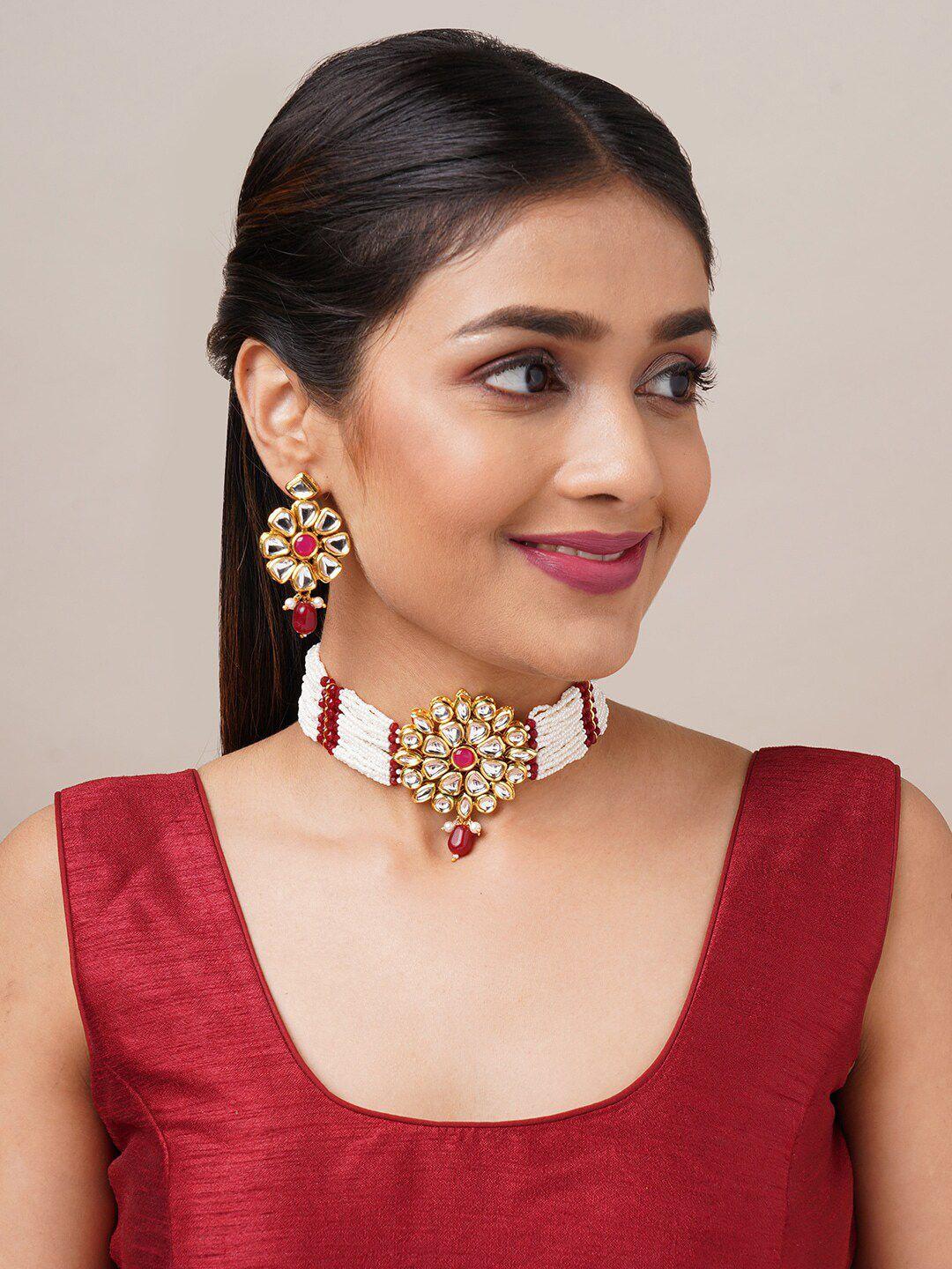binnis wardrobe gold-plated red kundan-studded & pearl beaded jewellery set