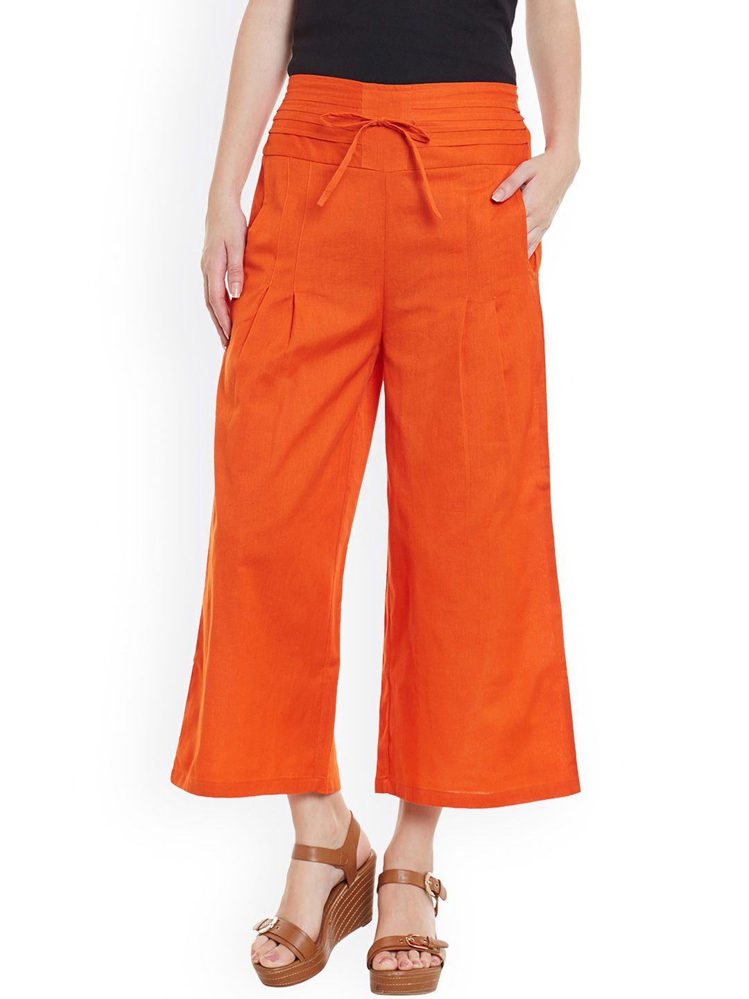 bitterlime women orange solid relaxed fit palazzo trousers