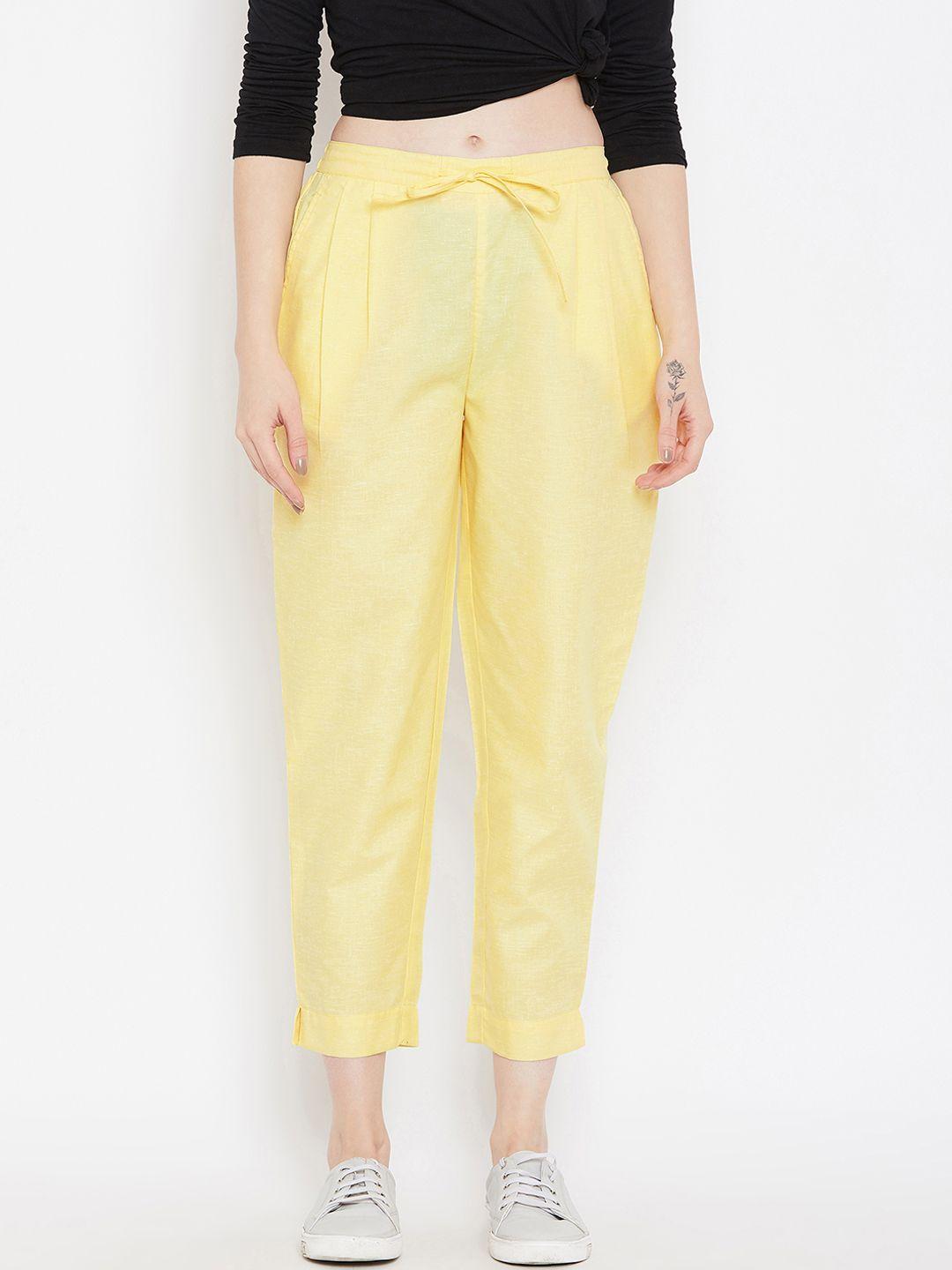 bitterlime women yellow relaxed regular fit self design cropped peg trousers